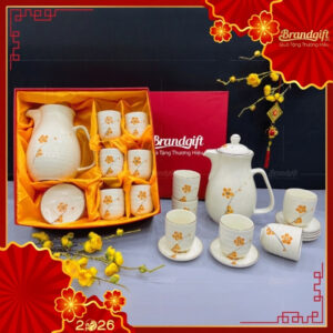 bo-am-tich-su-trang-hoa-tiet-hoa-dao-cam-ve-tay-bat-trang-at-94