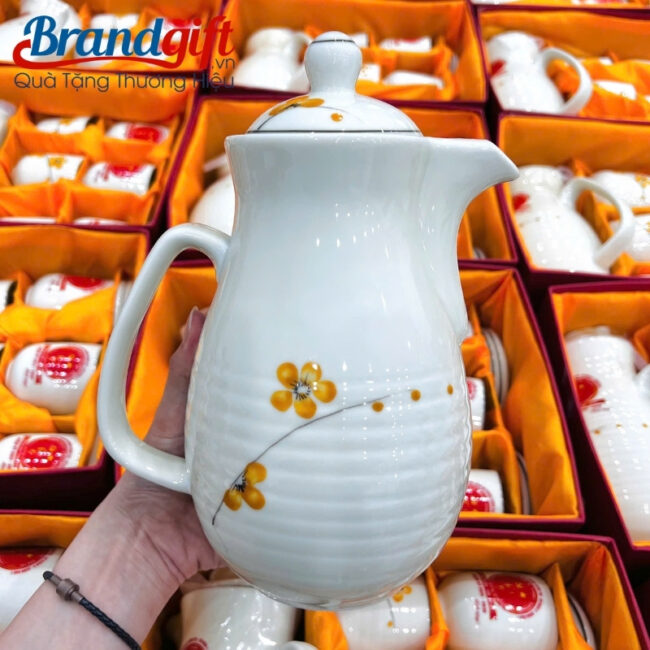 bo-am-tich-su-trang-hoa-tiet-hoa-dao-cam-ve-tay-bat-trang-at-94