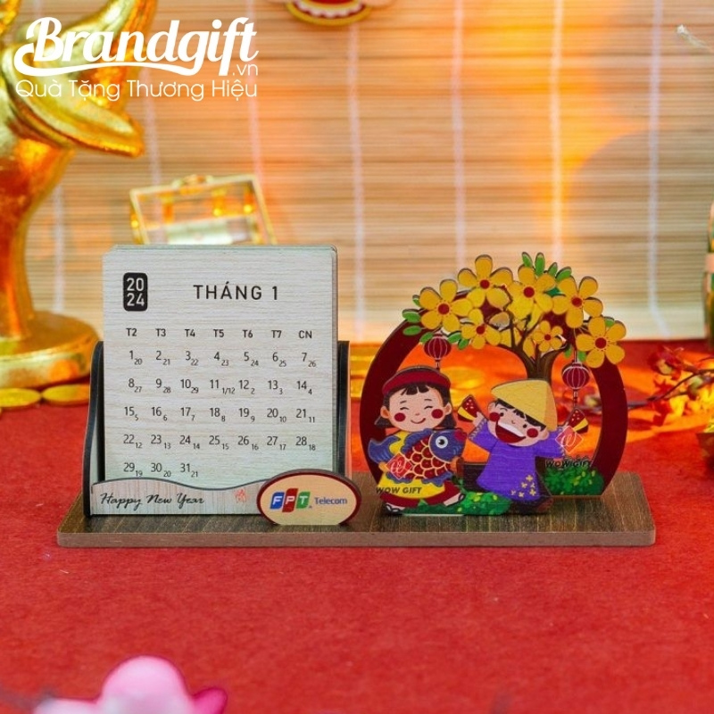 lich-de-ban-go-in-logo-lam-qua-tet-2026-hoa-tiet-em-be-vui-xuan-lt-09